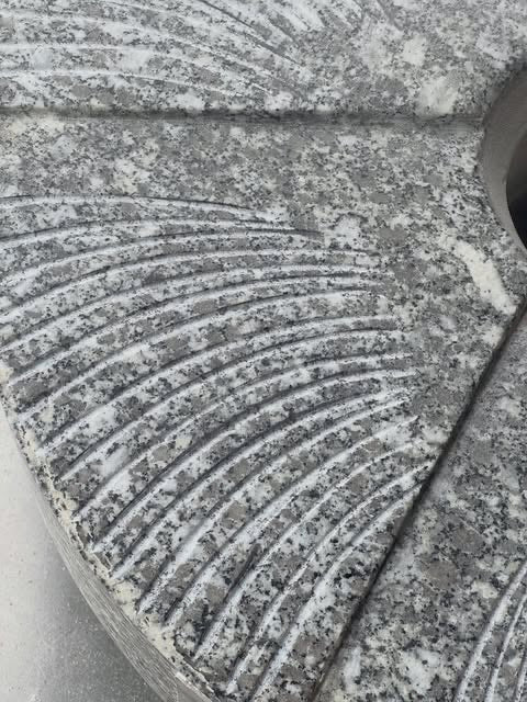 Close-up of the dressed furrows on the granite millstone